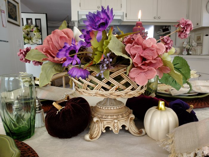 Thanksgiving Fall centerpiece with jewel tone pumpkins and pedestal basket container