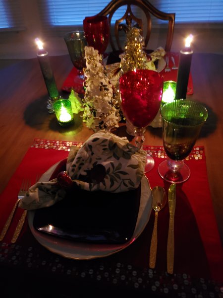 Christmas table for two in candlelight