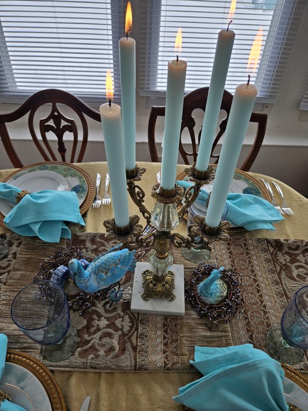 Peacock and gold tablescape