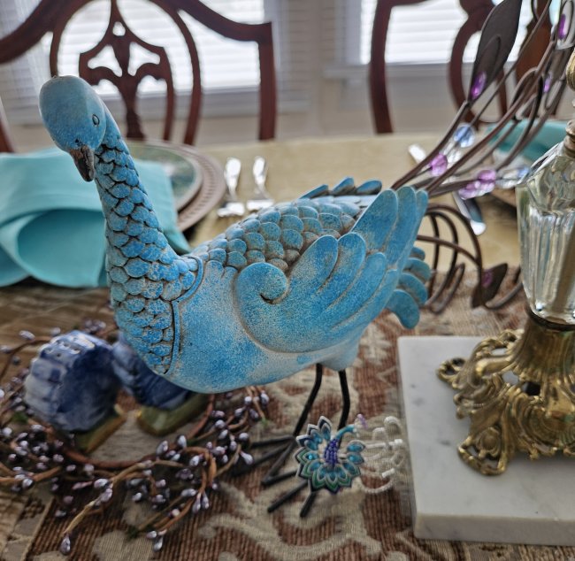 Peacock and gold tablescape