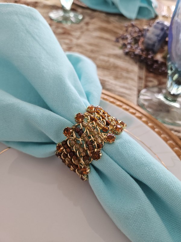 Peacock and gold tablescape