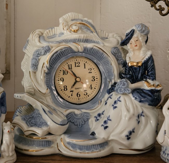 Blue and white mantle clock